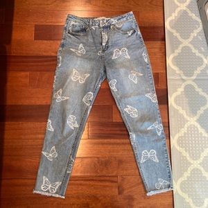 Butterfly print mom jeans.